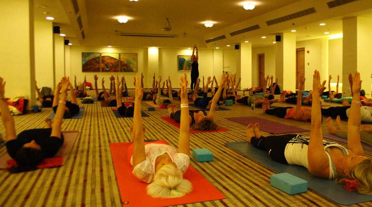 Visitors of the Mind, Body &amp; Spirit Festival at St Raphael Resort discovering the benefits of yoga