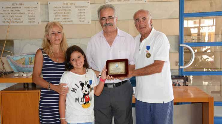 The Lebanese family receiving the emblem